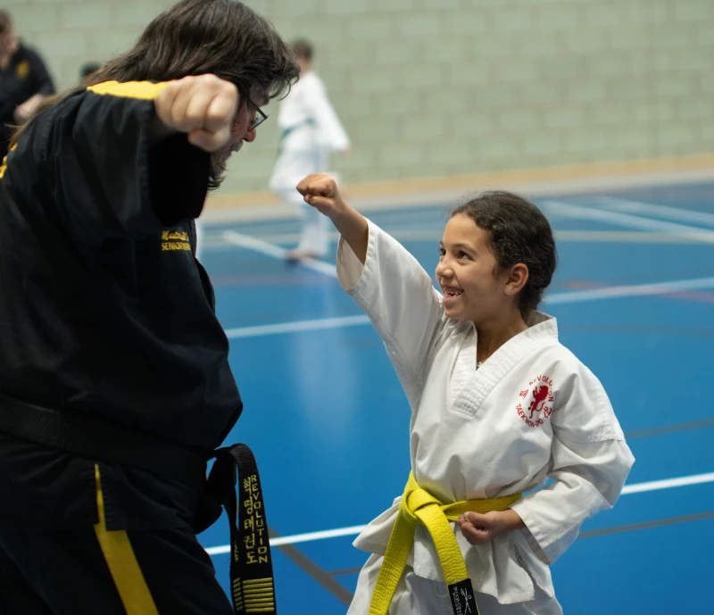 Master Russ teaches a very young girl student